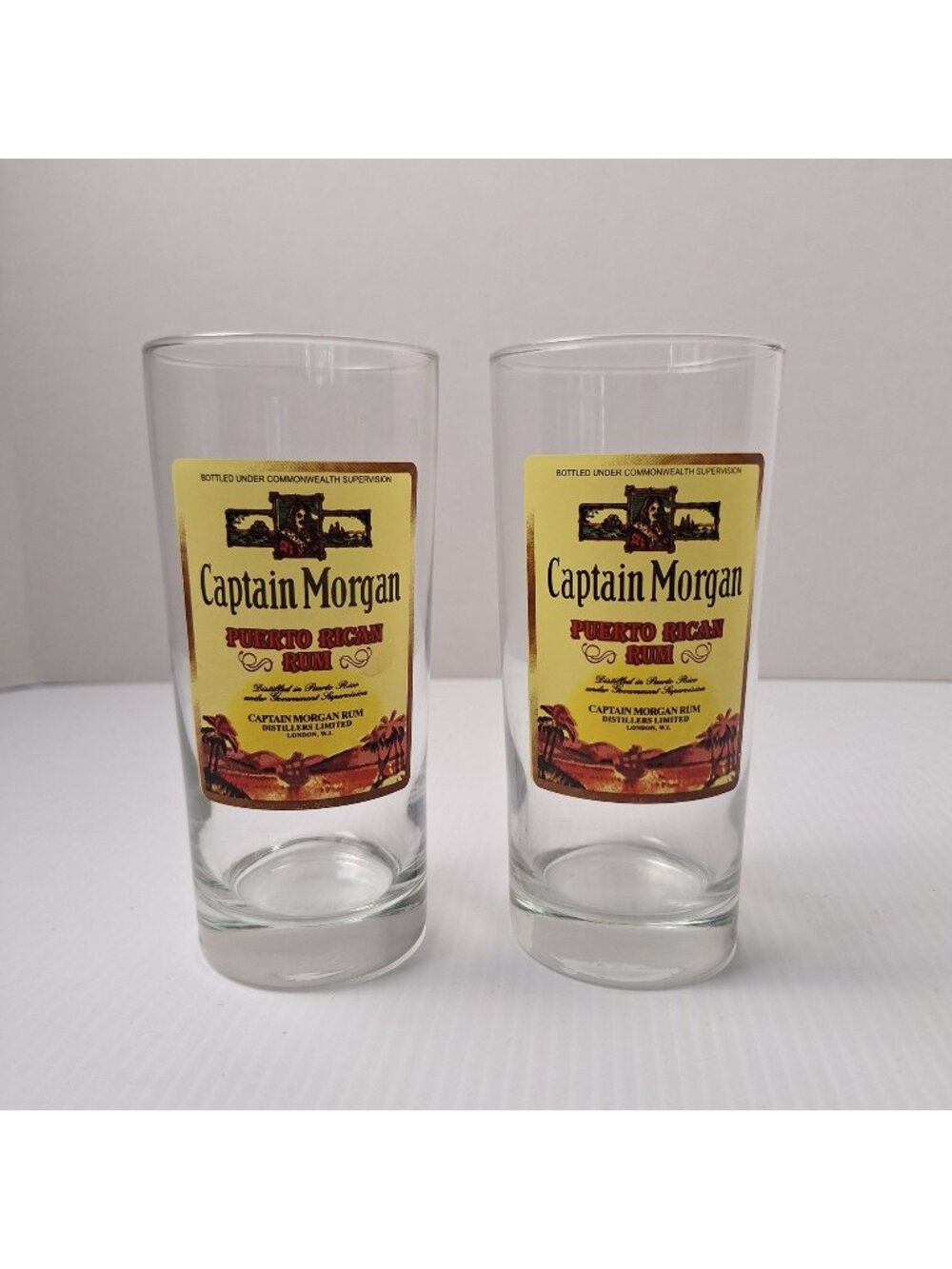 SET OF (2) CAPTAIN MORGAN PUERTO RICAN RUM HIGHBALL DRINKING GLASSES 6.25" EUC